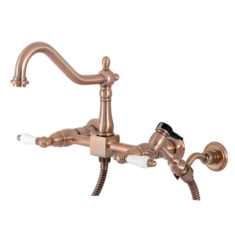 Kingston Brass Heritage Wall Mount Bridge Kitchen Faucet with Brass Spray, Antique Copper